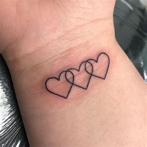 3 hearts tattoo|3 heart tattoos for family.